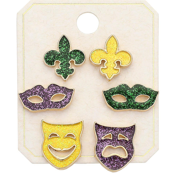 3 Pairs – Sparkly Enamel Mardi Gras Fleur de Lis Mask Stud Earring Set elevates your Mardi Gras style. The colorful enamel masks add a touch of sparkle to any outfit, while the Fleur de Lis symbol represents elegance and royalty. Perfect for showing off your love for the New Orleans celebration. 