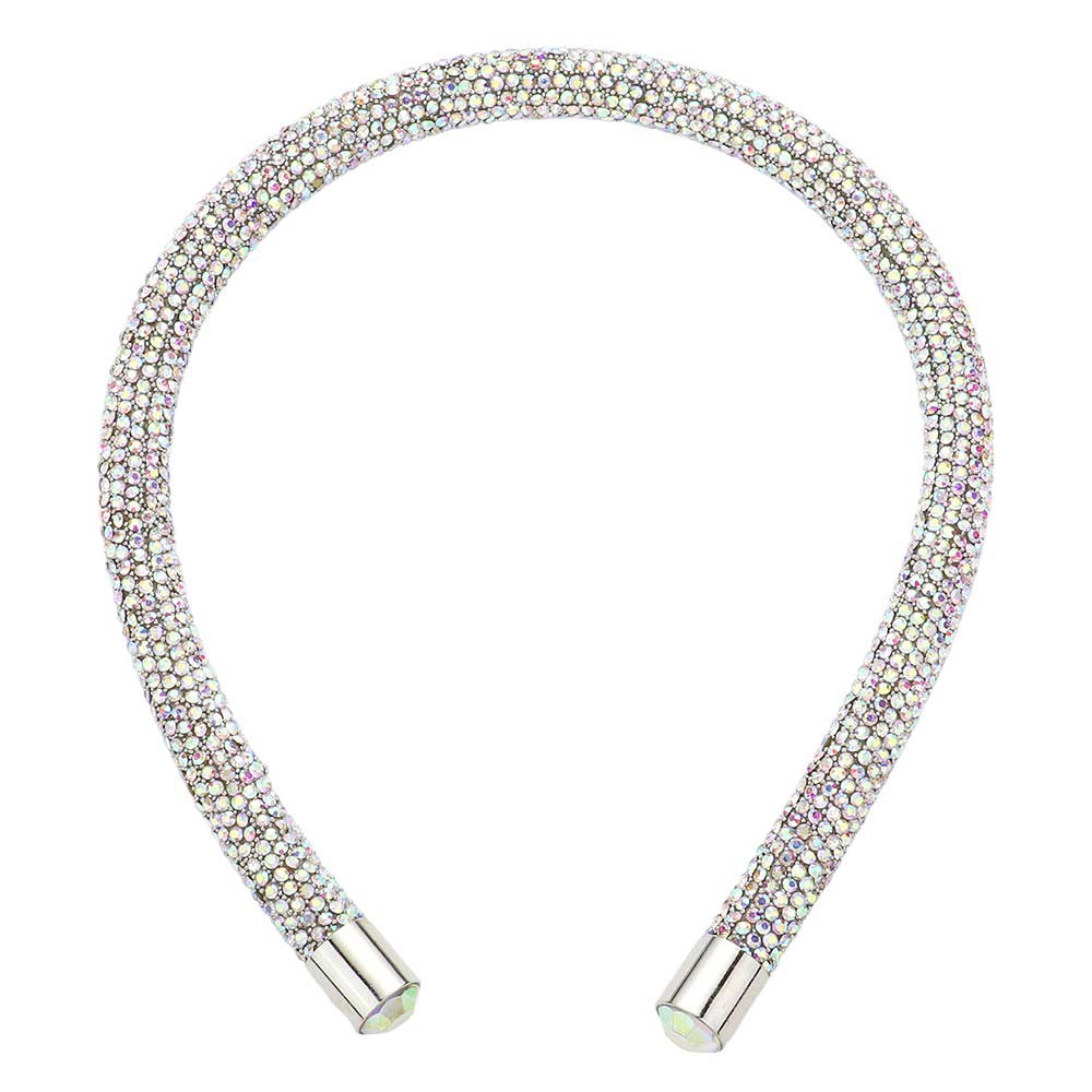 AB  Bling Headband. This stylish accessory is crafted with dazzling jewels and adds a touch of elegance to any outfit. Perfect for special occasions and everyday wear, the Bling Headband is sure to make a statement. Enhance your look with this must-have accessory.