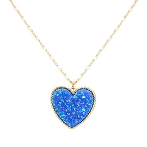 AB Blue Druzy Heart Pendant Necklace, this is a stunning accessory that adds a touch of sparkle to any outfit. The druzy heart pendant is beautifully crafted and catches the light for a mesmerizing effect. With its unique design and high-quality materials, this necklace is sure to make a statement and elevate your look.