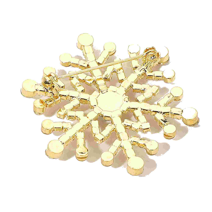Elegant snowflake brooch pin adorned with sparkling rhinestones in a dazzling winter design. Perfect accessory for coats, scarves, and holiday outfits, adding festive sparkle and seasonal charm to any look. A perfect gift for Christmas.