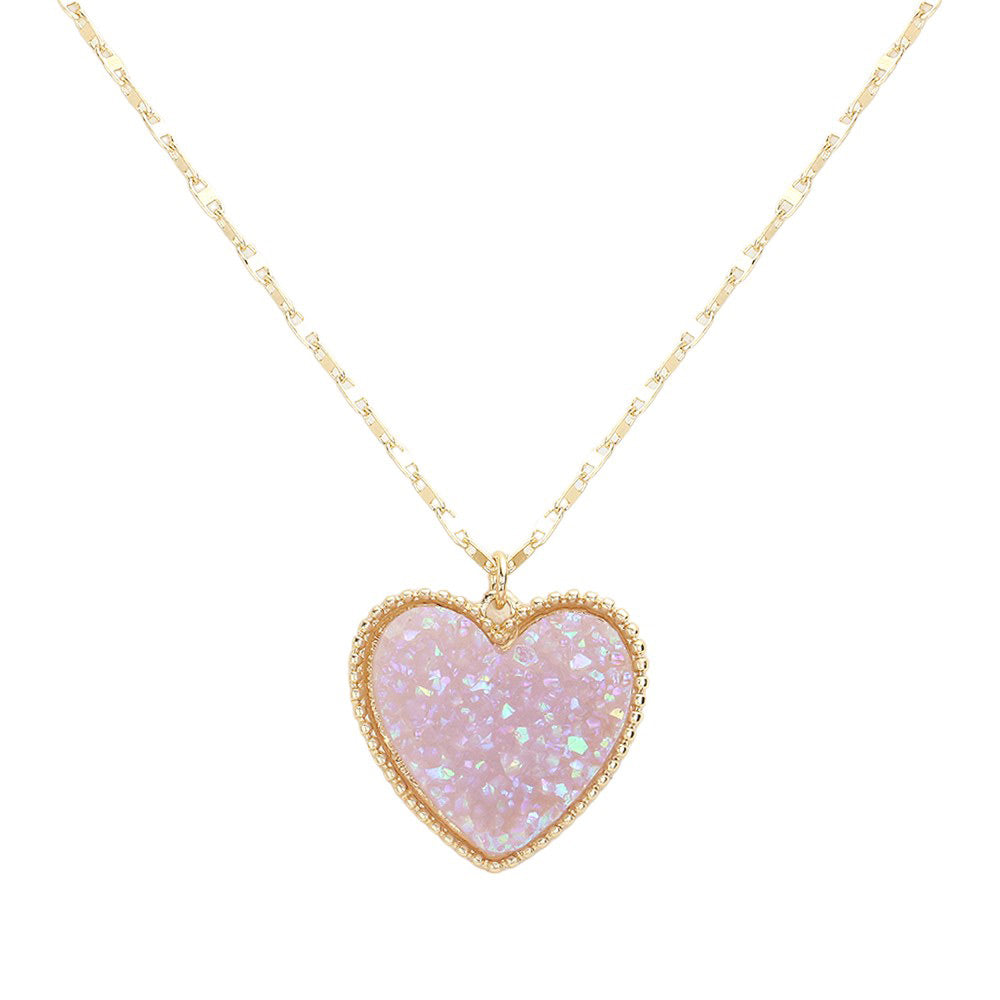 AB Lavender Druzy Heart Pendant Necklace, this is a stunning accessory that adds a touch of sparkle to any outfit. The druzy heart pendant is beautifully crafted and catches the light for a mesmerizing effect. With its unique design and high-quality materials, this necklace is sure to make a statement and elevate your look.