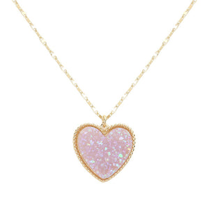 AB Lavender Druzy Heart Pendant Necklace, this is a stunning accessory that adds a touch of sparkle to any outfit. The druzy heart pendant is beautifully crafted and catches the light for a mesmerizing effect. With its unique design and high-quality materials, this necklace is sure to make a statement and elevate your look.