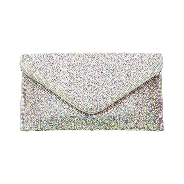 AB Silver Bling Stone Studded Clutch Bag doubles as a crossbody bag as well, making it a versatile and stylish choice for any evening occasion. The bling stones add a touch of glamour, while the flap envelope design keeps your belongings secure. Perfect for a night out, this bag will elevate any outfit.