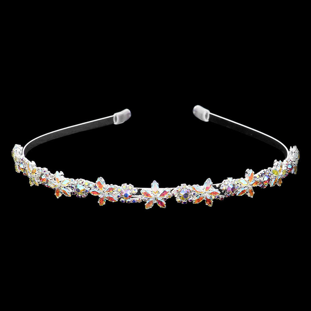 AB Silver CZ Flower Cluster Headband features sparkling CZ flowers that add a touch of elegance to any hairstyle. The headband is perfect for weddings, parties, or any special occasion. Crafted with meticulous attention to detail, this headband is sure to make a statement. Elevate your look with the CZ Flower Cluster Headband.