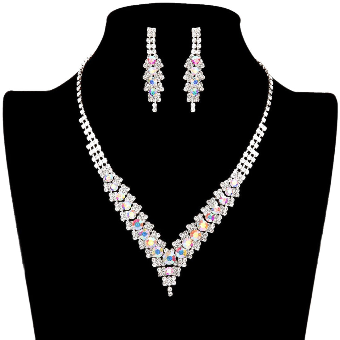 AB Gold V-Neck Collar Rhinestone Necklace, Adorn yourself with this eye-catching V-Neck Collar Rhinestone Necklace set. The elegant design features a delicate pattern of rhinestones that adds a touch of sparkle and shine to any outfit. Subtle yet stunning, this jewelry set is perfect for special occasions or everyday wear.