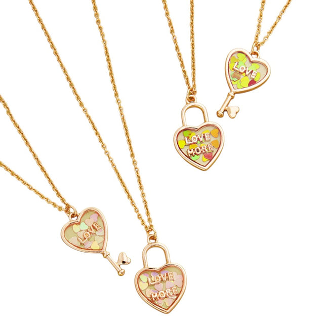 AB White 2-piece "Love &amp; Love More" BFF heart lock and key necklace set is the perfect symbol of friendship. Made of high-quality materials, it is a special and meaningful gift for your best friend. Show your love and strengthen your bond with this beautiful jewelry set.