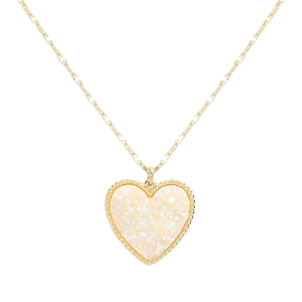 AB White Druzy Heart Pendant Necklace, this is a stunning accessory that adds a touch of sparkle to any outfit. The druzy heart pendant is beautifully crafted and catches the light for a mesmerizing effect. With its unique design and high-quality materials, this necklace is sure to make a statement and elevate your look.