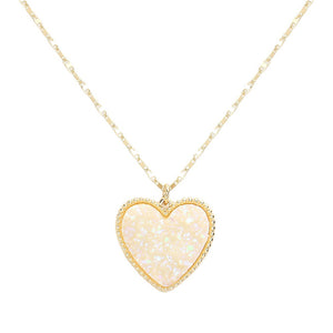 AB White Druzy Heart Pendant Necklace, this is a stunning accessory that adds a touch of sparkle to any outfit. The druzy heart pendant is beautifully crafted and catches the light for a mesmerizing effect. With its unique design and high-quality materials, this necklace is sure to make a statement and elevate your look.