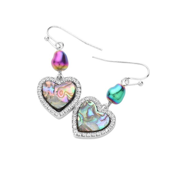 Abalone Heart Dangle Earrings are a stunning addition to any outfit. These earrings are crafted with the finest abalone shell and offer a unique and elegant touch. With their heart-shaped design, they are perfect for adding a touch of romance to any look. A must-have for any fashion-forward individual.