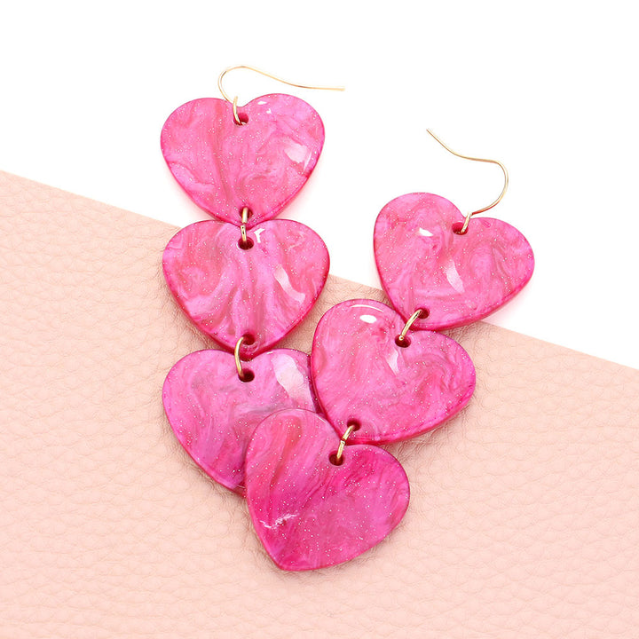 Acetate Heart Link Dropdown Earrings, Add a touch of elegance to your outfit. Made with high-quality acetate material, these earrings feature a unique heart link design that delicately dangles from your ears. Perfect for any occasion, these earrings are a must-have accessory for any jewelry collection.