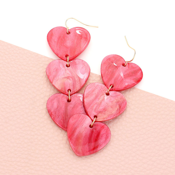 Acetate Heart Link Dropdown Earrings, Add a touch of elegance to your outfit. Made with high-quality acetate material, these earrings feature a unique heart link design that delicately dangles from your ears. Perfect for any occasion, these earrings are a must-have accessory for any jewelry collection.