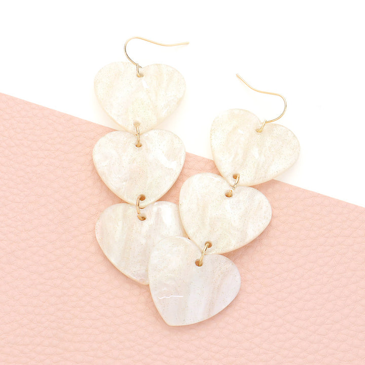 Acetate Heart Link Dropdown Earrings, Add a touch of elegance to your outfit. Made with high-quality acetate material, these earrings feature a unique heart link design that delicately dangles from your ears. Perfect for any occasion, these earrings are a must-have accessory for any jewelry collection.