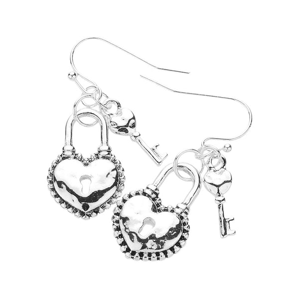 Antique Metal Heart Lock Key Dangle Earrings are a timeless addition to any jewelry collection. The antique metal finish gives them a vintage feel, while the heart lock and key design add a romantic touch. Made with quality material, these earrings are durable and will elevate any outfit. 