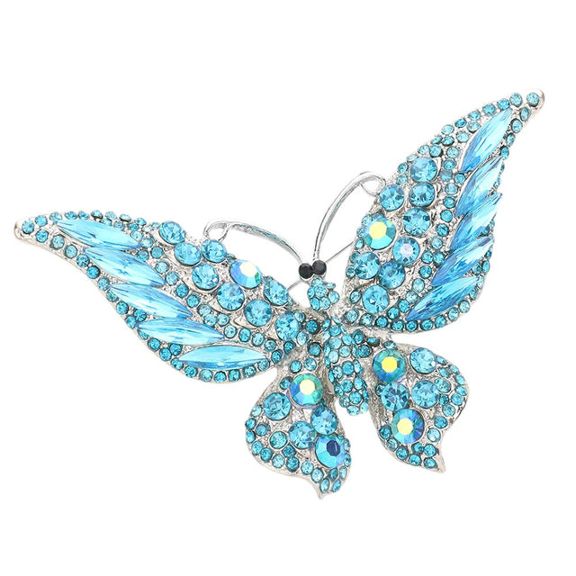 Aqua Glass Crystal Butterfly Pin Brooch is expertly crafted with sparkling glass crystals, adding a touch of elegance and sophistication to any outfit. With its timeless butterfly design, this tasteful accessory is perfect for any occasion. Enhance your ensemble with a touch of shimmer and charm.