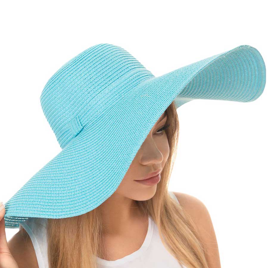 Aqua Solid Floppy Straw Sun Hat, Stay stylish and protected from the sun with our sun hats! Made from high-quality straw, this hat is perfect for any sunny day. Its floppy design not only looks fashionable but also provides ample shade for your face and neck. Don't forget to pack this accessory for your next beach trip!
