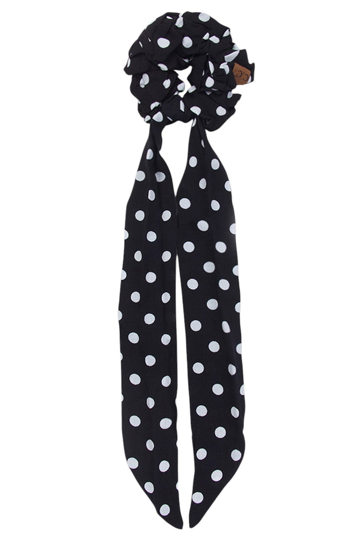 Black C.C. POLKA DOT SASH SCRUNCHIES offer a stylish and practical way to keep hair in place. With their fun polka dot design and handy sash, they are perfect for any hair type. Made with high-quality materials, these scrunchies are durable and comfortable for all-day wear.