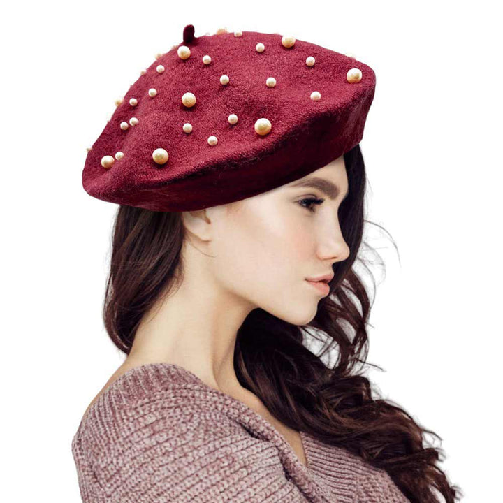 BURGUNDY-Pearl Embellished Tam Beret Hat, Featuring a classic beret design, this stylish hat is adorned with elegant pearls for a touch of sophistication.Adding a touch of glamour to any outfit, this hat is a must-have accessory for any fashion-forward individual.Upgrade your style today with our Pearl Embellished Tam Beret Hat