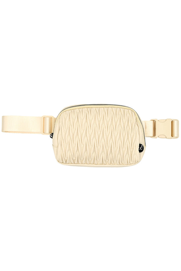 Beige The C.C Materasse Embodiment Fanny Pack offers a sleek and stylish way to carry your essentials. With its durable materasse material and spacious design, this pack provides both functionality and fashion. Perfect for travel or everyday use.