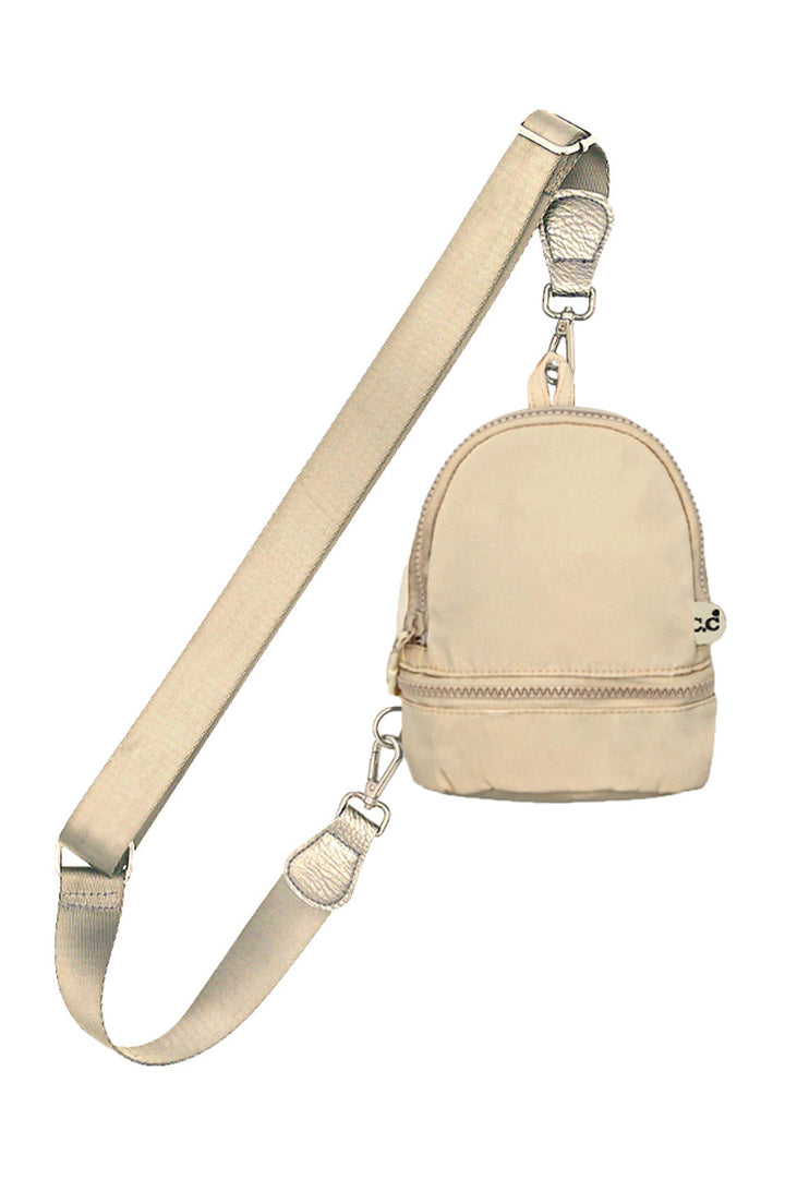 Beige C.C Mini Solid Sling Backpack offers a compact yet functional design, perfect for hands-free convenience. Crafted with durable materials, it ensures long-lasting use while providing secure storage for essentials. Its adjustable strap allows for a comfortable fit, making it ideal for daily errands or travel. This sleek backpack combines practicality with style, delivering expert-level utility in a minimalist package. 