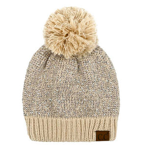Beige C.C Sequin Cuff Pom Pom Beanie Hat, Stay warm and stylish even during the coldest days with this. This hat is made with durable materials for long-lasting comfort and features a cozy and fashionable pom pom on the top. The added sequin cuff adds a glamorous touch to the classic beanie style. Perfect winter gift idea.