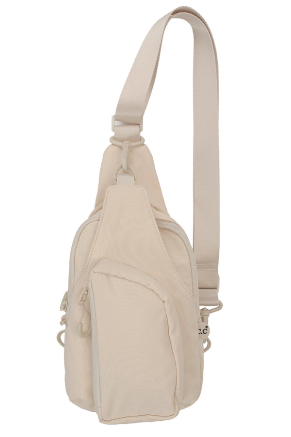Beige C.C Solid Crossbody Sling Bag is a stylish and versatile accessory for any outfit. Its durable design and multiple compartments make it perfect for storing all your essentials, while its crossbody strap allows for hands-free convenience. Stay organized and fashionable with this must-have bag.