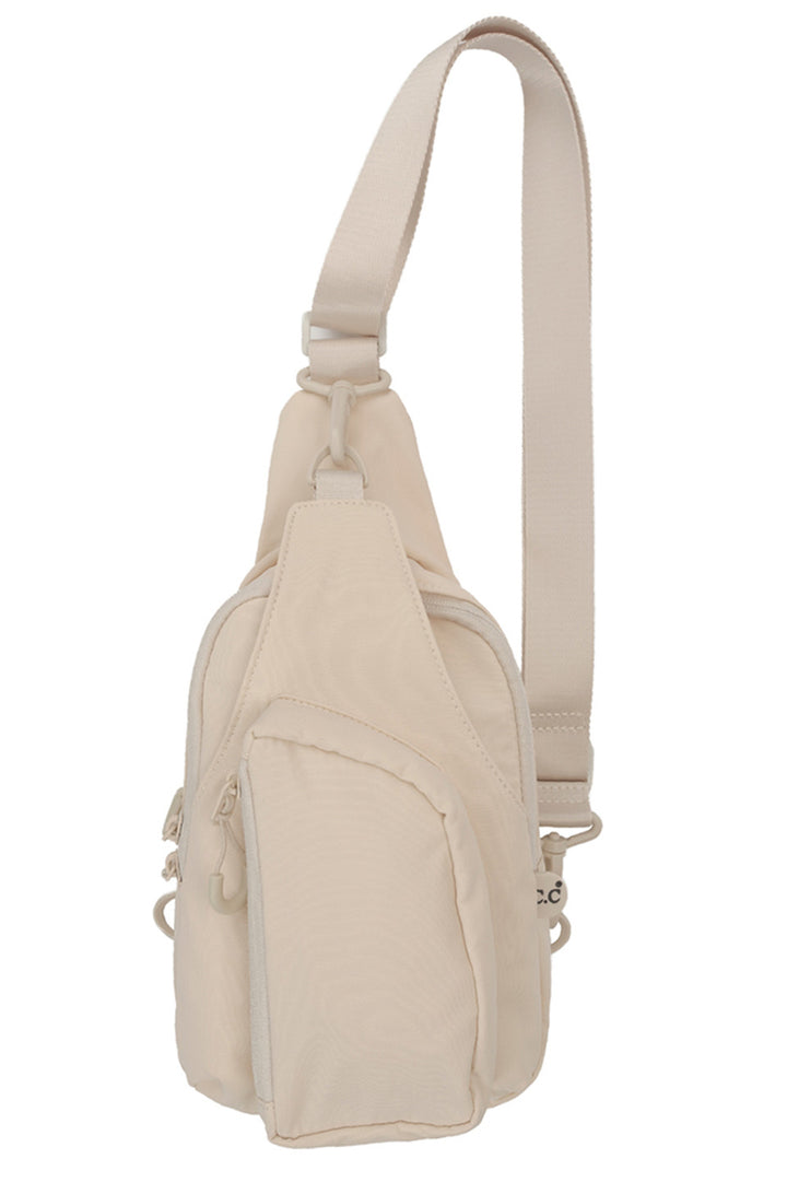 Beige C.C Solid Crossbody Sling Bag is a stylish and versatile accessory for any outfit. Its durable design and multiple compartments make it perfect for storing all your essentials, while its crossbody strap allows for hands-free convenience. Stay organized and fashionable with this must-have bag.