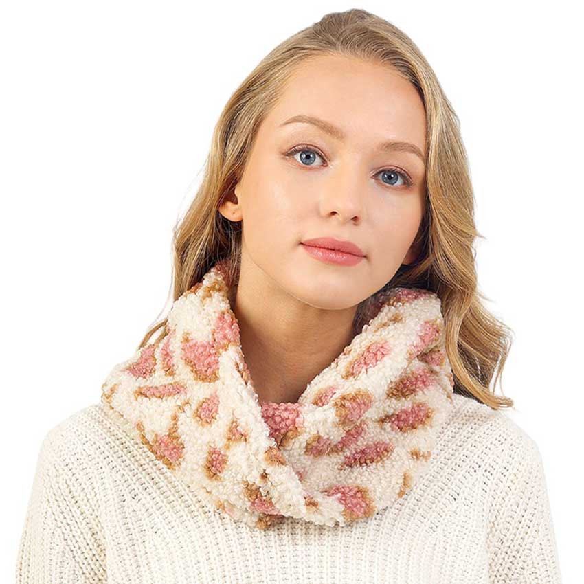 Beige Colorful Leopard Pattern Teddy Bear Infinity Scarf, is made from soft and lightweight fabric, making it perfect for keeping warm and stylish. The colorful leopard pattern design adds a touch of fun and style to any outfit. The generous size makes it versatile for multiple looks.