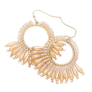 Beige Faceted Beaded Dangle Earrings, will add a touch of subtle sparkle to your outfit. Crafted with a modern and eye-catching design, these earrings feature a faceted bead, a tiered circle, and a dangle pattern for a unique and stylish look. Perfect for either a special occasion or everyday wear.