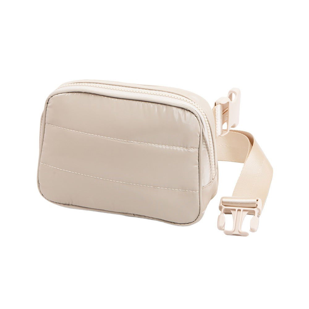 Beige Glossy Puffer Rectangle Sling Bag Fanny Bag Belt Bag, this stylish is bag made from durable material to ensure maximum protection and comfort. It features a fashionable design with adjustable straps, and secure buckle closure ensuring your valuables are safe and secure. The perfect for any occasion, shopping, etc.
