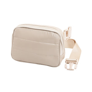 Beige Glossy Puffer Rectangle Sling Bag Fanny Bag Belt Bag, this stylish is bag made from durable material to ensure maximum protection and comfort. It features a fashionable design with adjustable straps, and secure buckle closure ensuring your valuables are safe and secure. The perfect for any occasion, shopping, etc.