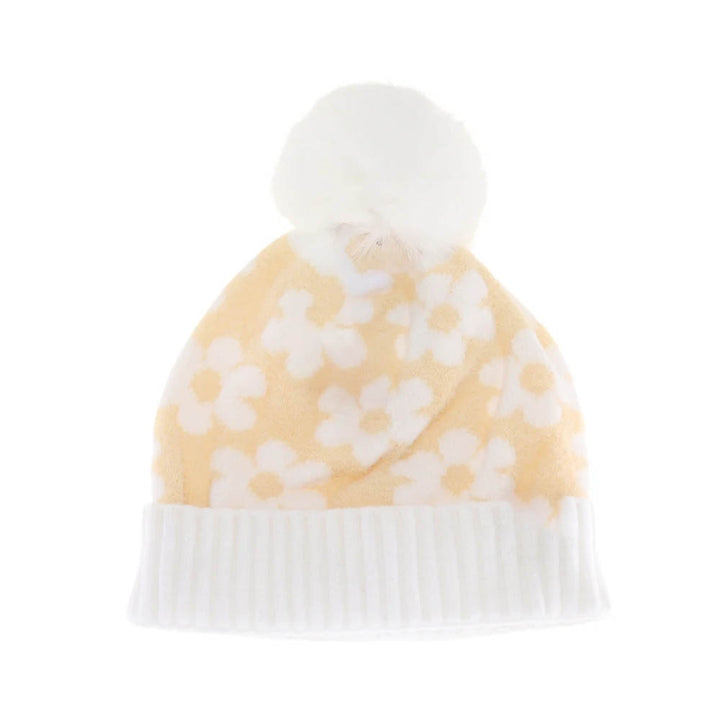 Beige KIDS Daisy Faux Fur Pom C.C Beanie combines warmth and style for active children. Crafted from soft, insulating material, it provides cozy protection during cold weather. The playful faux fur pom adds a fun, fashionable touch, making it ideal for everyday wear or outdoor activities. Durable and easy to wear, this beanie offers both comfort and a snug fit for kids on the go. 