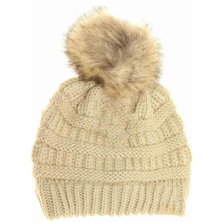 Beige Kids Fur Pom CC Beanie combines warmth and style with a soft, comfortable fabric that shields young heads from cold weather. Its plush fur pom adds a fashionable accent while maintaining breathability, ensuring all-day comfort and protection during outdoor play or casual outings. Designed for durability and ease of wear, this beanie is an essential winter accessory for active children. 