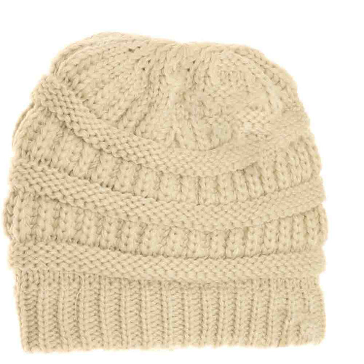 Beige Kids Solid Fuzzy Lined CC Beanie combines durable construction with a plush interior to provide exceptional warmth and comfort for children. Designed with a secure fit and a minimalist, solid color style, this beanie is perfect for keeping young ones protected from cold weather while supporting active play. Its fuzzy lining enhances insulation without adding bulk, making it an excellent choice for daily wear in colder climates. 