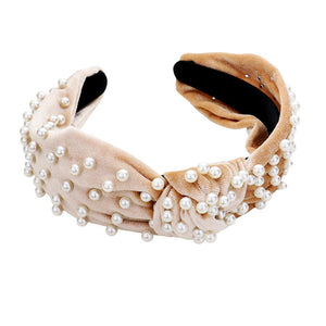 Beige Pearl Velvet Knotted Headband, is the perfect accessory for any outfit. Crafted from luxurious pearl velvet, it will add a touch of sophistication to your look. Its knotted design will stay securely in place, making it ideal for any busy lifestyle. An ideal gift accessory for your family members and friends.