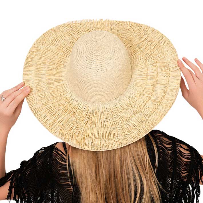 Beige Raffia Tassel Pointed Sun Hat, this hat is expertly crafted for both style and function. Made from natural raffia, it offers UV protection and a chic, pointed silhouette. The playful tassel accents add a touch of whimsy, making it the perfect accessory for any sunny day. Ideal gift choice for fashion-forwarded friends.\