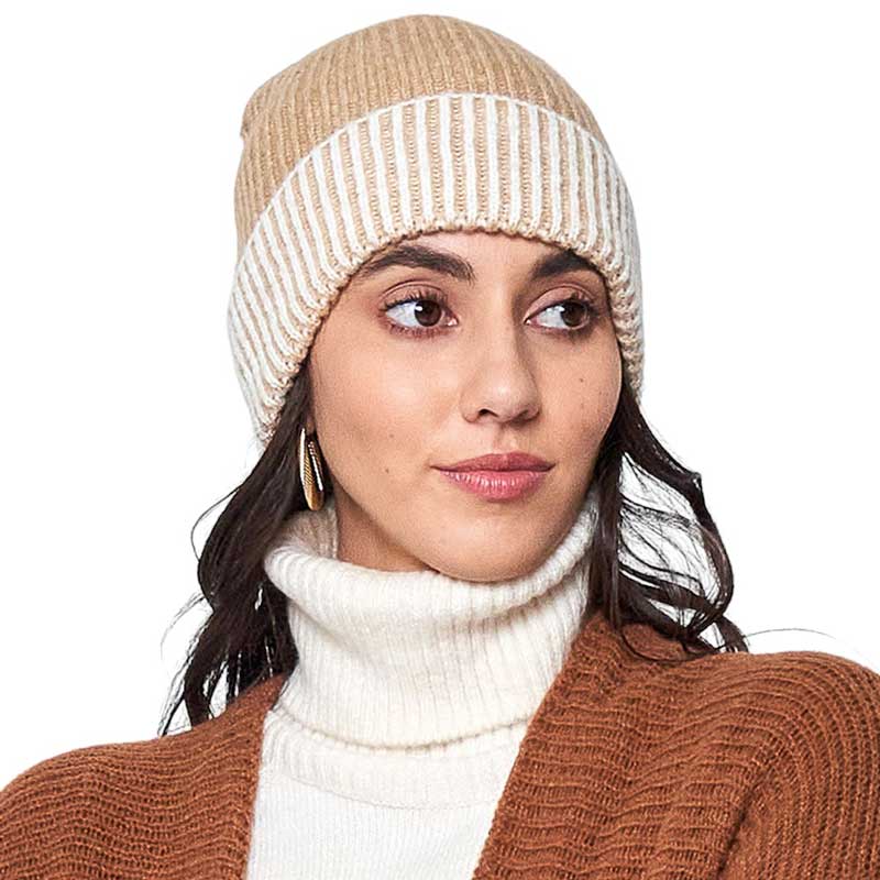 Beige Two Tone Cuff Beanie Hat, Stay stylishly warm during the cold with this. Crafted with two distinct and complementary colors, this beanie hat is designed to add a touch of flair to any winter ensemble. Built for maximum comfort and warmth, it is perfect for outdoor activities and as a perfect winter gift.