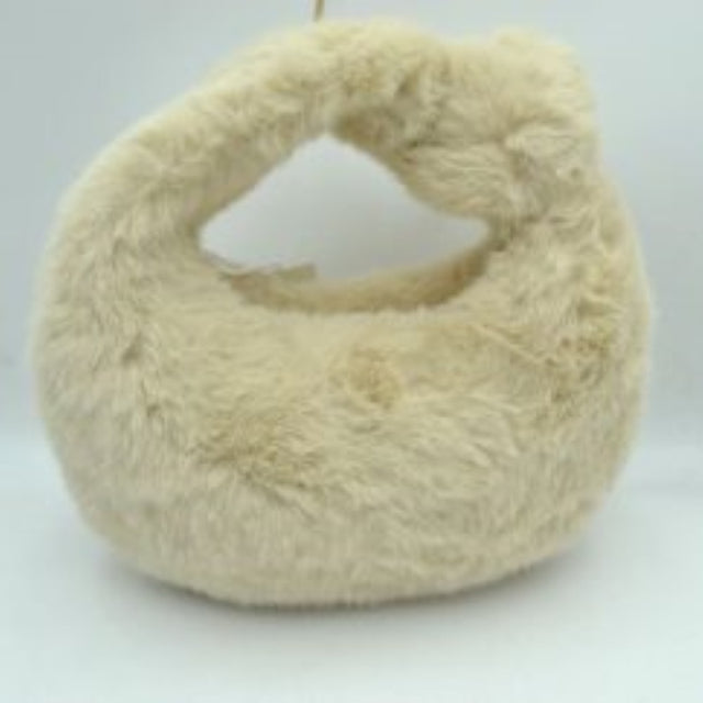 Beige This hobo-style handbag features a distinctive fluffy, textured plush exterior that wraps entirely around the body and handle for a soft finish. Designed for effortless everyday use, it showcases a curved crescent silhouette with a wide, integrated top handle that fits comfortably in the hand or on the arm. An open-top entry provides quick access to the main storage compartment, making it a playful yet practical accessory for carrying daily essentials.