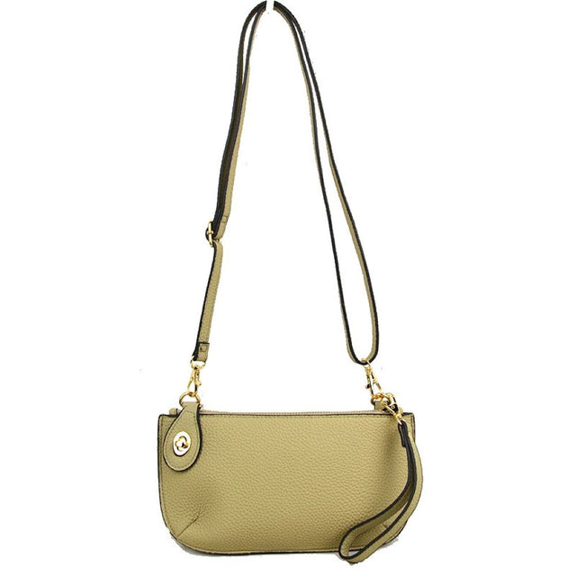 Beige This versatile everyday bag features a compact pebbled textured body with a slightly curved base silhouette. Designed for organized daily or evening use, the main storage compartment is secured by a top zipper closure and accented with a small decorative metallic turn-lock detail on the side panel. It offers multiple carrying options, equipped with a long, adjustable crossbody shoulder strap and a shorter matching wristlet loop