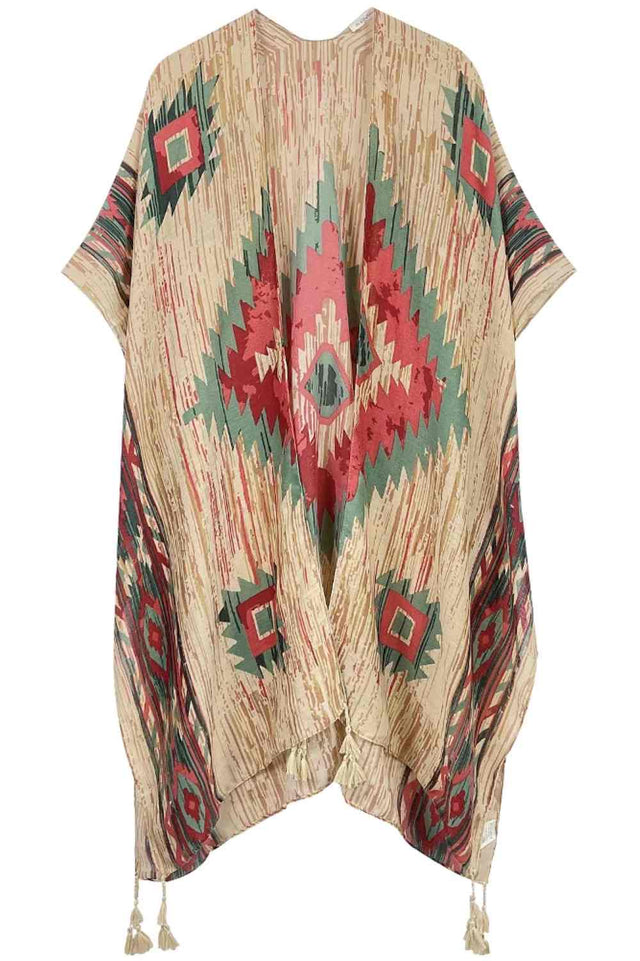 Beige Embrace bohemian elegance with this Aztec Print Tassel Kimono. Featuring vibrant geometric patterns inspired by traditional Aztec designs, this lightweight piece drapes beautifully over any outfit. The decorative tassels add movement and flair, while the generous 35.4" x 35.4" dimensions provide versatile styling options. Crafted from soft, breathable 100% polyester, it's perfect for layering during warmer months or as a beach cover-up. An effortless way to add cultural-inspired style to your wardrobe