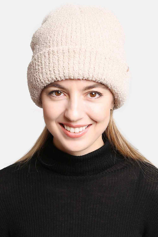 Beige Double Layered Solid Beanie features a clean, minimalist design with double-layer construction for extra warmth and insulation on cold days. Crafted with a soft stretch fit, it delivers cozy comfort while keeping your winter style effortlessly simple.