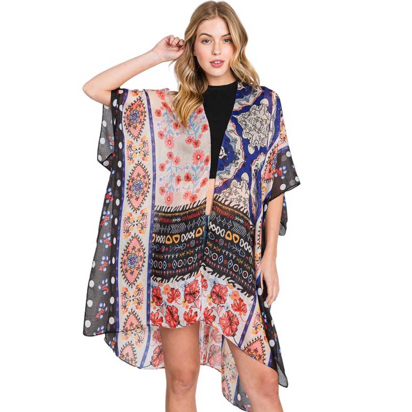 Black Abstract Paisley Flower Print Kimono Poncho, Expertly crafted with an abstract paisley print, this kimono poncho is a versatile addition to any wardrobe. Made with lightweight, breathable material, it's perfect for layering over any outfit for a chic look. Enjoy the unique design and comfortable fit of this piece.