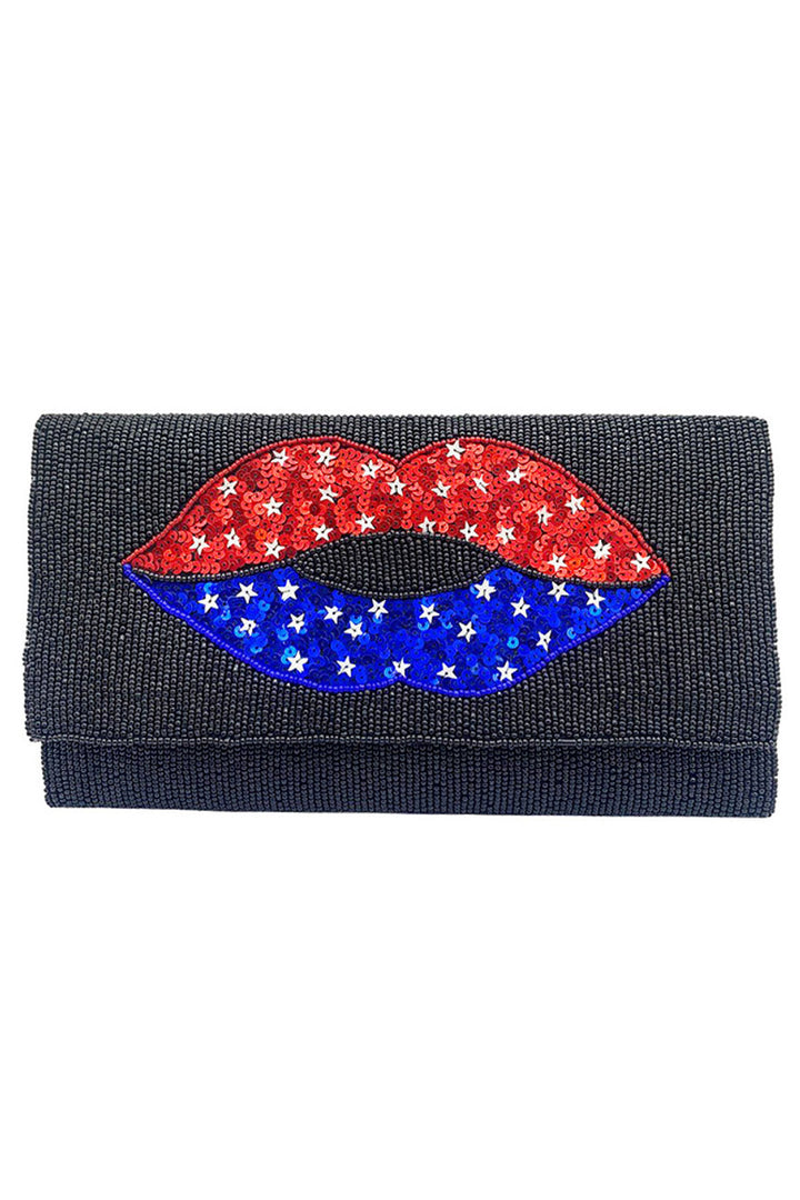 American Flag Lips Glass Beads Clutch combines patriotic design with sophisticated craftsmanship. Featuring intricate glass beadwork shaped into bold lips adorned with the American flag, this clutch offers a striking statement piece for formal events or special occasions. Its compact size ensures easy carrying while securely holding essentials, making it both a functional accessory and a unique expression of style and national pride. 