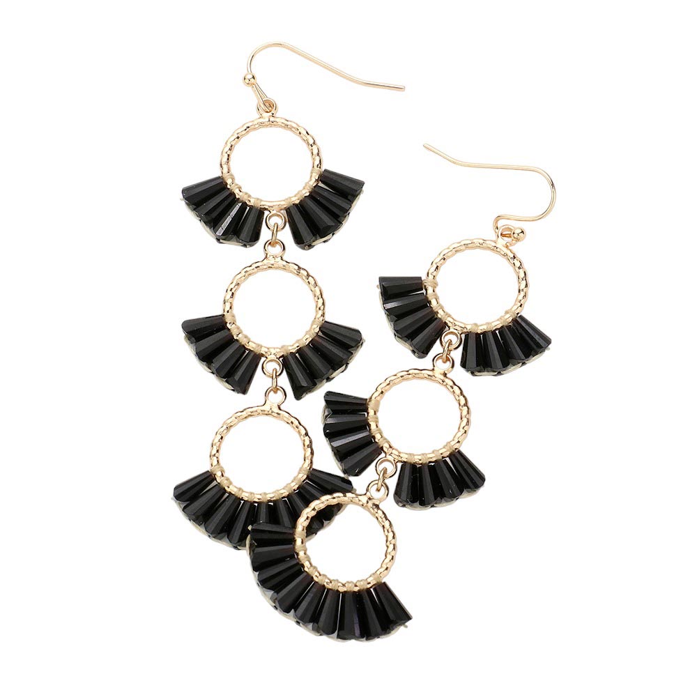 Black Beaded Triple Hoop Dropdown Dangle Earrings, are an eye-catching accessory. With three interlocking rings, each beaded with vibrant colors, this earring set provides a perfect accent to any outfit. Lightweight and fashionable, these earrings can be dressed up or down, making them suitable for any occasion.