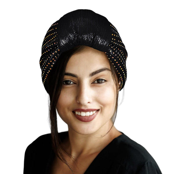 Black Bling Turban Hat, this stylish hat is sure to turn heads. Crafted using premium materials, the hat features a modern design with sparkling sequins to create an eye-catching look. Perfect for special occasions, this hat is sure to add a touch of glamour to any outfit. Fashionable winter gift idea.