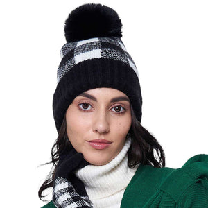Black Buffalo Check Patterned Faux Fur Pom Pom Beanie Hat, is perfect for all weather conditions. Crafted from high-quality faux fur material, this hat is designed to keep you warm and cozy in cold temperatures. It is an ideal choice for gifting to your loved ones in this Christmas season.