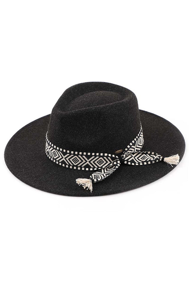 Black-C.C Aztec Trim Vegan Felt Panama Hat is a must-have accessory for any fashion-forward individual. Made with 100% vegan felt, this hat is not only stylish but also eco-friendly. The Aztec trim adds a unique touch, making it a statement piece for any outfit. Stay on-trend and feel good about your fashion choices with this panama hat.