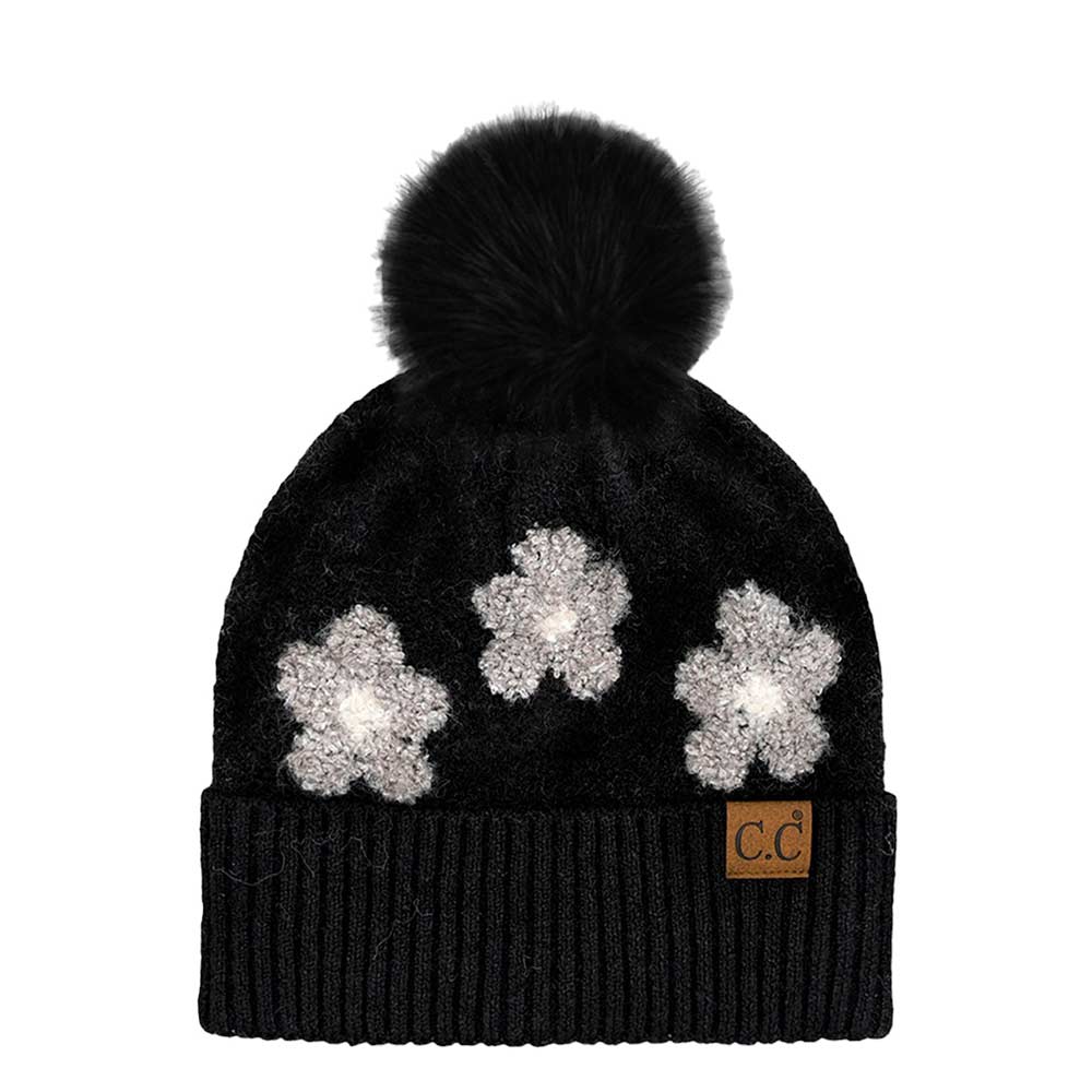 Black C.C Daisy Pattern Beanie with Pom, stay warm and fashionable in this cozy, stylish beanie with pom. It's soft and warm and made from yarn for superior comfort. The playful pom accent adds a delightful touch of fun to any outfit. Awesome winter gift accessory for birthdays, Christmas, anniversaries, and family.