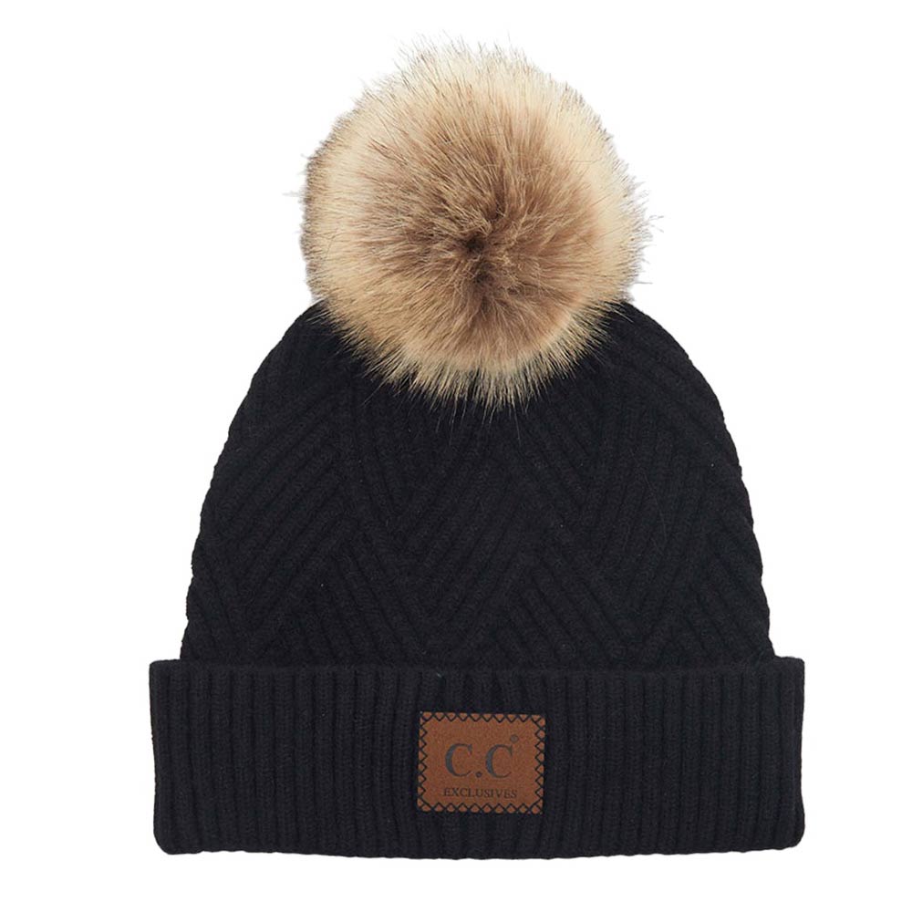 Black C.C Heather Beanie Hat With Pom Pom And Suede Patch, provides excellent protection and a fashionable look with its soft heather knit material, faux fur pom pom, and stylish suede patch. The fabric is designed to keep you comfortably warm in cold weather. Add this fashionable accessory to the winter wardrobe collection.