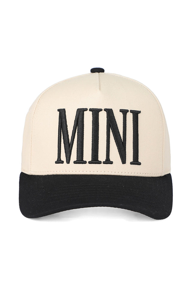 Black C.C. Mini Embroidered Kids Snapback Trucker Cap combines style and comfort tailored for children. Featuring a breathable mesh back and adjustable snap closure, it ensures a secure fit for growing heads. The detailed embroidery adds a polished look, making it a durable and fashionable accessory for everyday wear or outdoor activities. Ideal for protecting young ones from the sun while keeping them trendy. 
