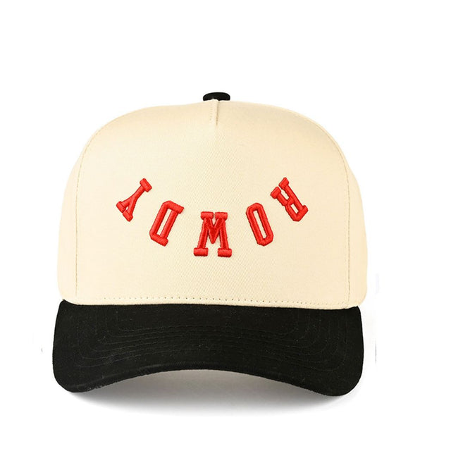 Black Turn up the attitude with the C.C Rowdy two-tone trucker hat, featuring bold letter embroidery that brings fearless, sporty style to any outfit. Designed with a classic baseball cap silhouette and breathable mesh back, it offers comfortable all-day wear with an effortlessly cool finish.